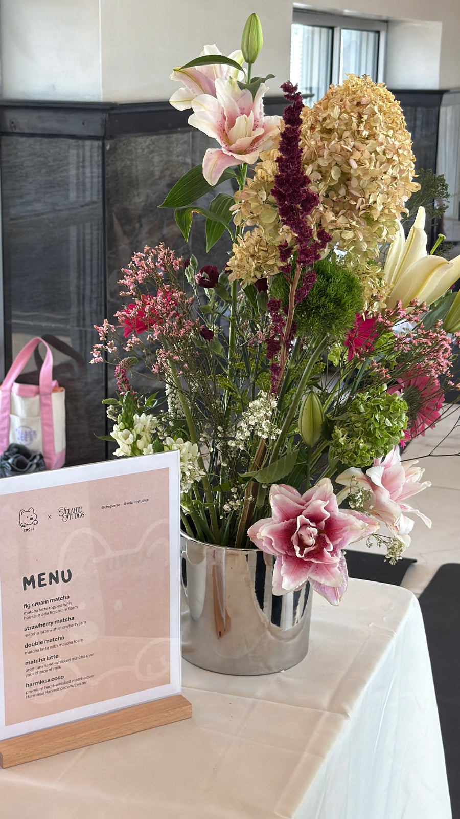 Choji matcha pop-up bar with flowers and menu at Solante Studios, Greenpoint