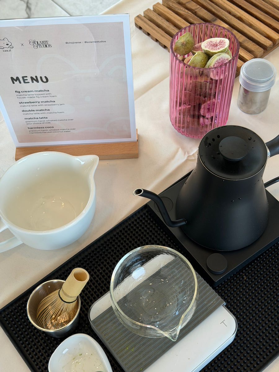 Matcha whisk, kettle and menu at the Choji x Solante pop-up